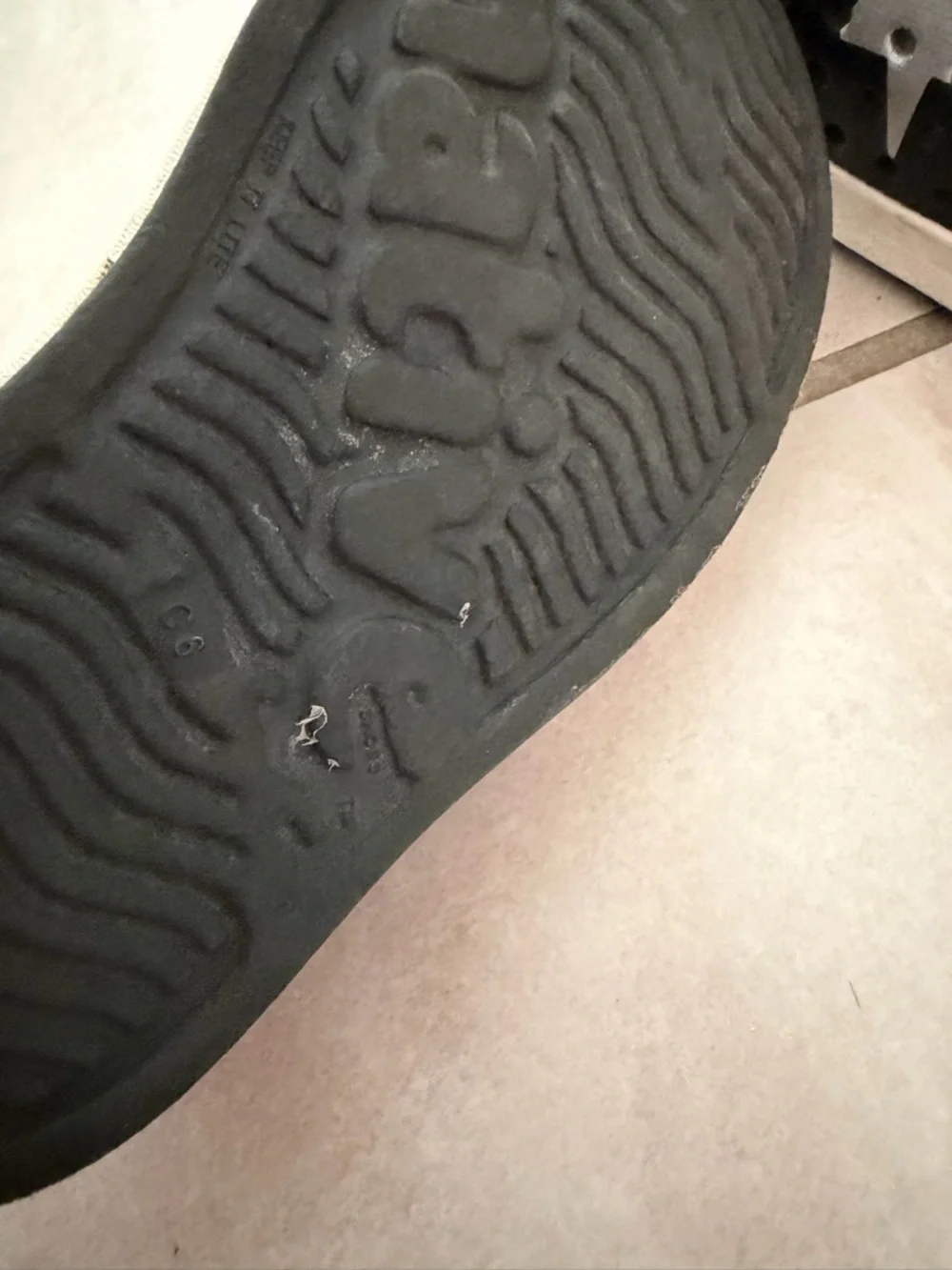 Native Black Star Slip-On Water Shoes with White Stars